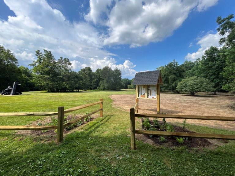 A photo of the educational kiosk, fence and garden Max led over 35 others to build at the Nassau County Museum of Art in Roslyn Harbor