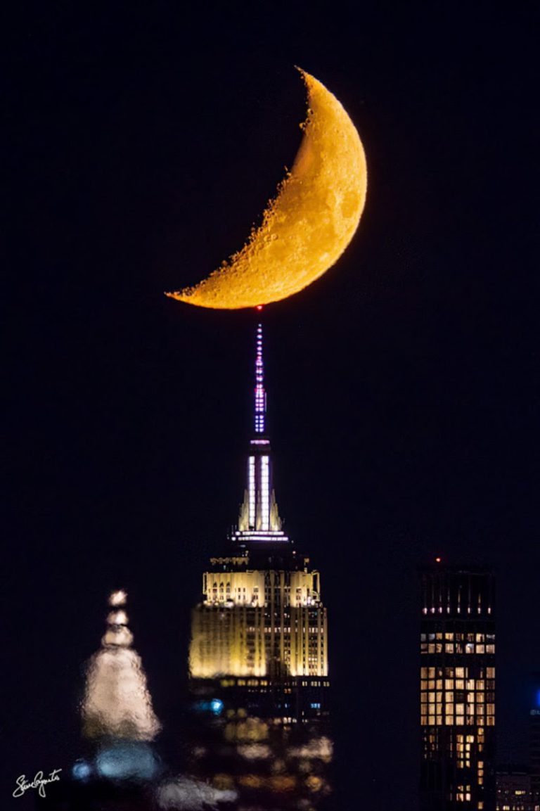 Photo of the moon over the Empire State Building by Firefly Steve Caputo